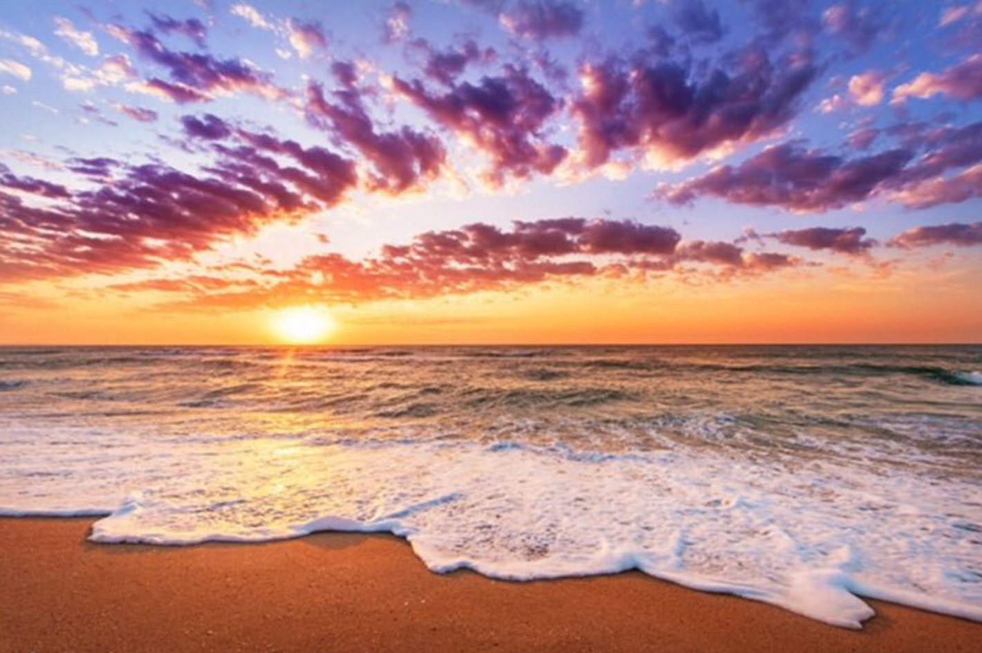 Bølgeskvulp i solopgang/solnedgang