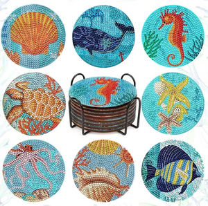 8 stk diamond painting bordskånere med forskellige i havdyr i stærke farver.