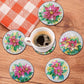 Diamond painting drikkebrikker med farverige juleblomster.