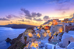 Diamond painting af de klassiske hvide huse på Santorini. Smuk solnedgang over husene og havet