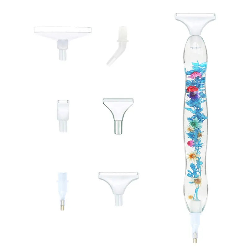 Gennemsigtig pen med tørret blomst i. Benyttes til diamond painting. 6 stk udskiftelige tipper.