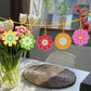 Blomsterophæng med diamond painting. 9 forskellige motiver i stærke farver.
