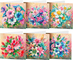 6 stk forskellige blomsterkort med diamond art. Mål: 15x30 cm. Foldes på midten.