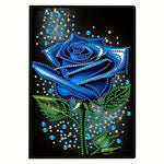 Sort lædernotesbog med diamond painting. Blå rose.
