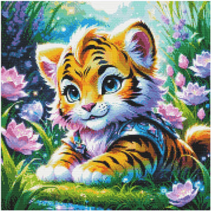 Nuttet tigerunge i blomstereng